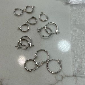 Assorted sizes 12 pc 14k white gold earrings